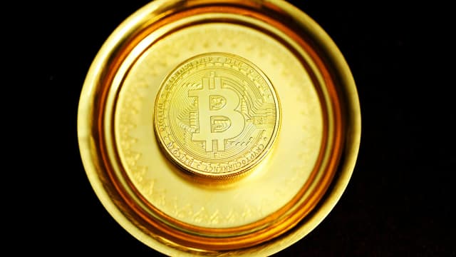 Bitcoin Slides Below $69,500 as Oil Tops $100 on Tanker Strikes